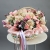 Композиция в корзине "Диодора" из французских роз Квиксенд, диантусов и кустовых пионовидных роз Бомбастик в Старой Купавне